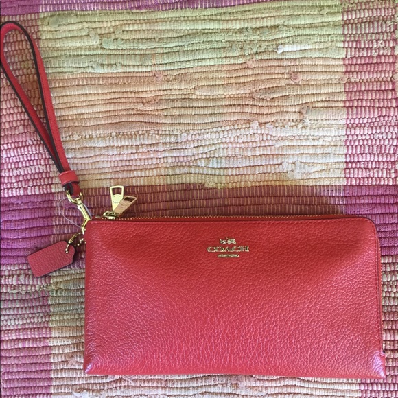 Coach Handbags - NWOT Coach pink pebbled leather zip wallet